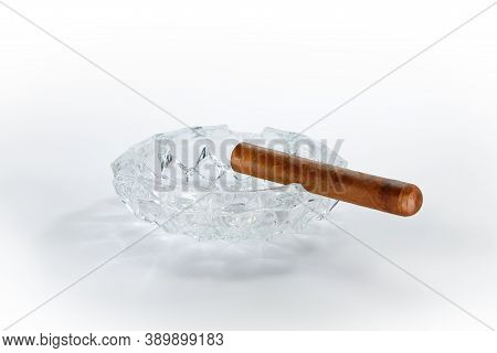 Close Up View Of Nice Robusto Cuban Cigar And Ashtray On White Back