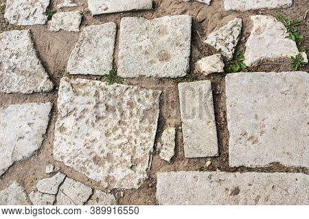 Stone Paving Of Road, Path Paved With Cobblestone