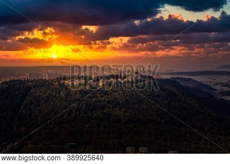 Aerial View Of Burnaby Mountain During A Vibrant Sunset. Taken In Greater Vancouver, British Columbi
