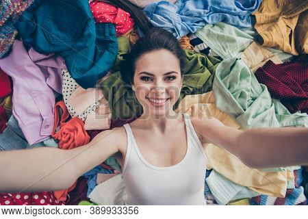 High Angle Above View Closeup Photo Of Pretty Lady Home Spring Cleaning Household Lying Many Clothes
