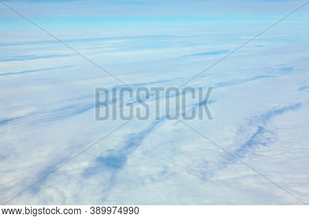 Only Clouds Below . White Snowy Cloudscape Background