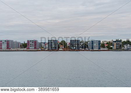 Apartment Buildings On The Coastline In Port Of Hafnarfjordur In Iceland