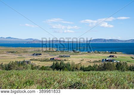 Vacation Cottages At The Banks Of Lake Thingvallavatn In Icelandic Countryside