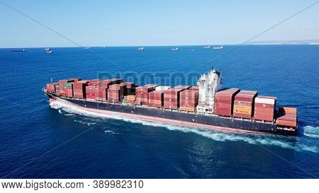 Haifa, Israel - October 1, 2020: Ulcv Fully Loaded With Freight Container. Ultra-large Container Ves