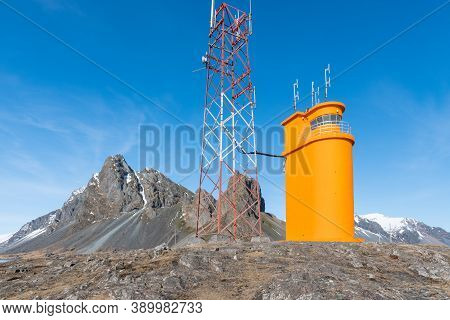 The Lighthouse Of Hvalnes In East Icelandic Rural Countryside Landscape