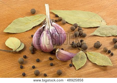 Garlic With The Bay Leaf And Black Pepper