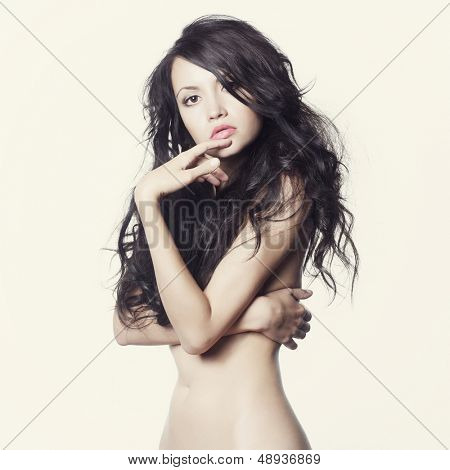 Photo of young naked lady with long perfect hair