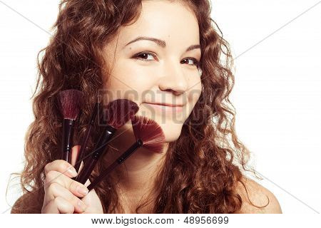 woman is making make-up