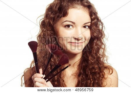 woman is making make-up