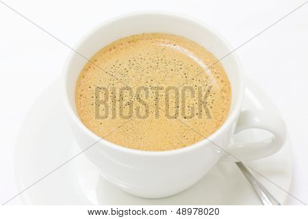 Up close shot of coffee with a golden beige colour