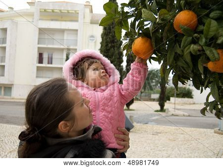 The Little Beatiful Girl With Her Mather