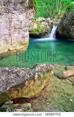 Spring Wood And River. Waterfall.