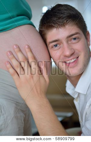 happy young cuple, pregnant woman
