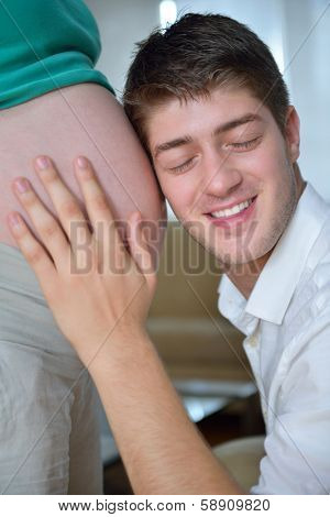 happy young cuple, pregnant woman