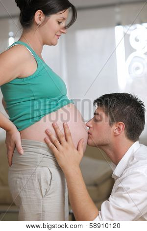 happy young cuple, pregnant woman
