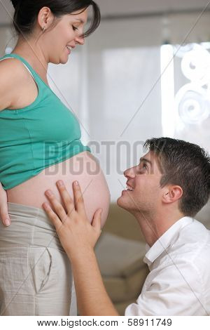 happy young cuple, pregnant woman