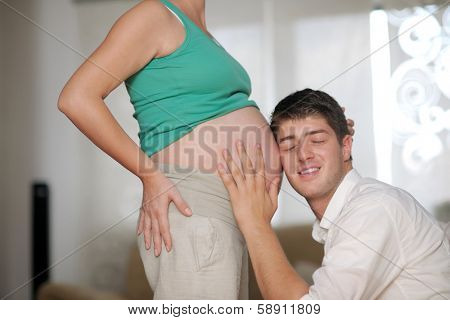 happy young cuple, pregnant woman