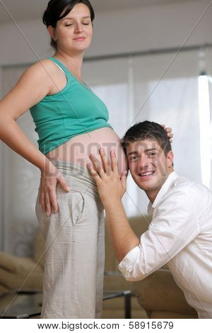 happy young cuple, pregnant woman