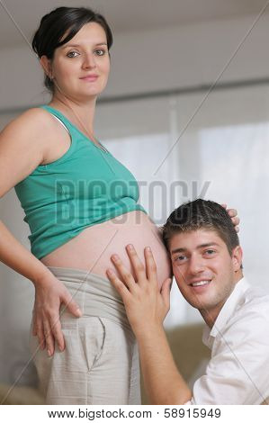 happy young cuple, pregnant woman