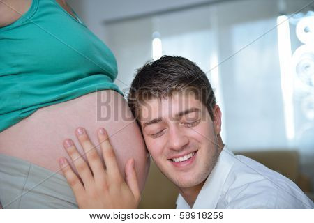 happy young cuple, pregnant woman