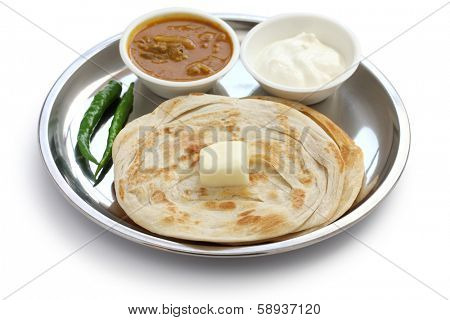 plain paratha with curry and yogurt, indian food