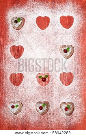 Valentine's Day Cookies With Cranberries And Mint  On Red Wooden Table