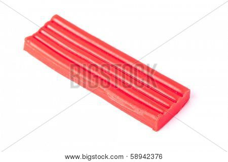 Single bar of plasticine isolated on whit background