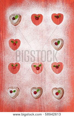 Valentine's Day Cookies With Cranberries And Mint  On Red Wooden Table