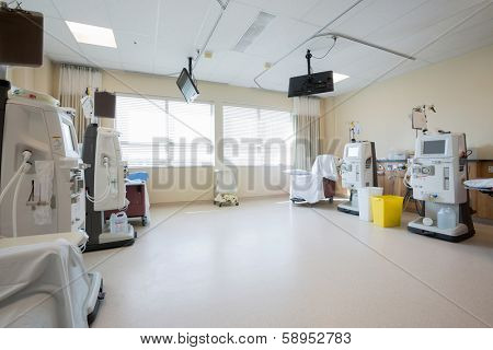 Dialysis machines in empty hospital room