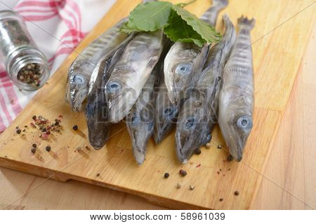 Raw ice fish on a cutting board