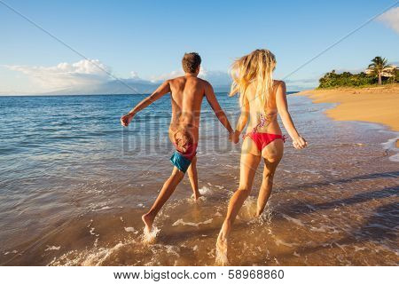 Romantic Couple Enjoying Sunset on Beautiful Tropical Beach