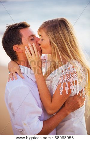 Romantic Couple Enjoying Sunset on Beautiful Tropical Beach, Love Honeymoon Concept