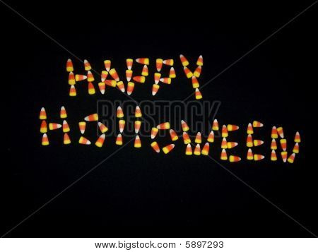 与糖果玉米黑背地面上所作的快乐 Holloween