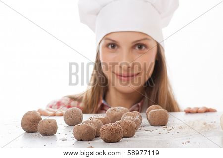 dough balls and woman chef cook