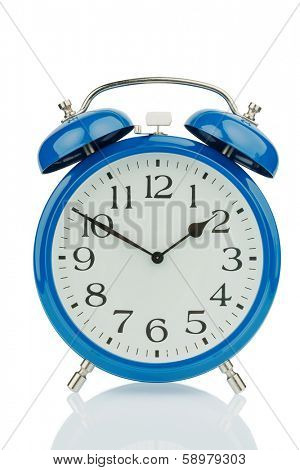 a blue alarm clock on white background. a wake white dial