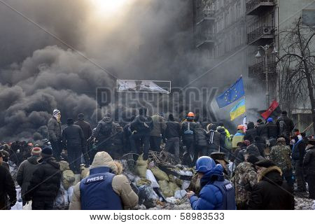 KIEV, UKRAINE - JANUARY 23, 2014: Anti-government protest in Kiev,  Grushevsky str.  People defend barricades.