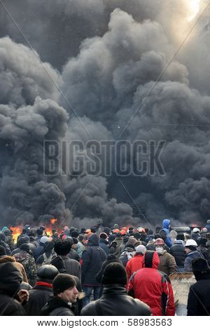 KIEV, UKRAINE - JANUARY 23, 2014: Anti-government protest in Kiev,  Grushevsky str.  People defend barricades.