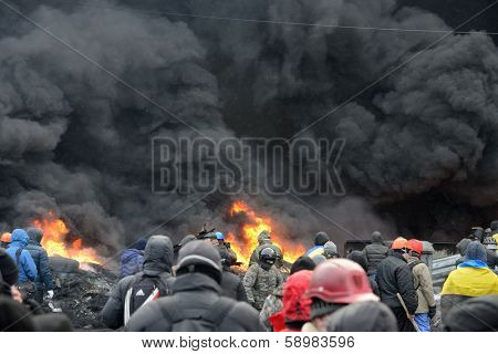 KIEV, UKRAINE - JANUARY 23, 2014: Anti-government protest in Kiev,  Grushevsky str.  People defend barricades.
