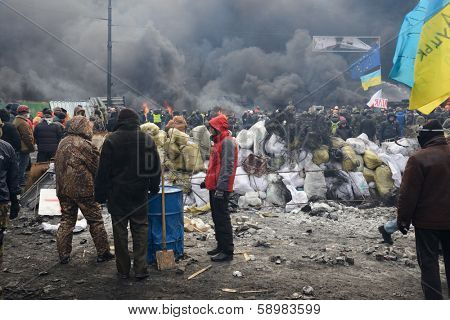 KIEV, UKRAINE - JANUARY 23, 2014: Anti-government protest in Kiev,  Grushevsky str.  People defend barricades.