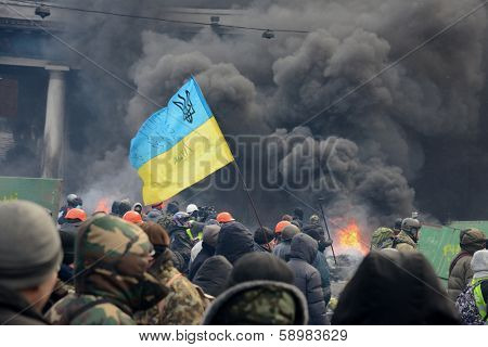KIEV, UKRAINE - JANUARY 23, 2014: Anti-government protest in Kiev,  Grushevsky str.  People defend barricades.
