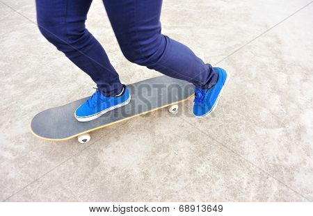 woman skateboarder at skatepark