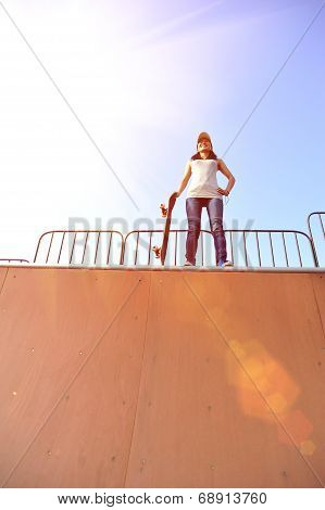 woman skateboarder at skatepark