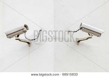 Security Cameras, Two Cctv At The Building Corner