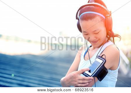 Runner athlete listening to music i