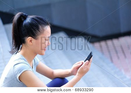 Woman using smart phone