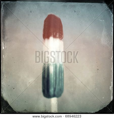 Instagram filtered image of a red white and blue ice desert