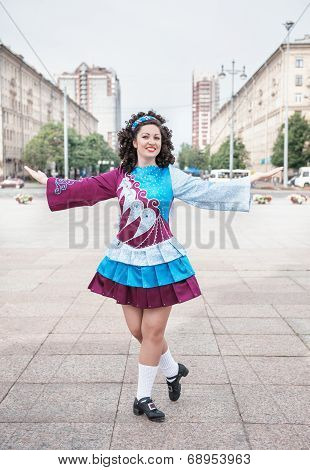 Young Woman In Irish Dance Dress Posing