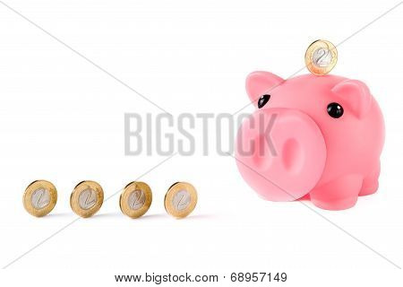 Piggy Bank And Coins Isolated