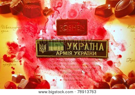 Kiev,Ukraine.Dec 20.Illustrative editorial. Chevron of Ukrainian Army.With logo Roshen Inc. Trademark Roshen is property of ukrainian president Poroshenko.At December 20,2014 in Kiev, Ukraine 