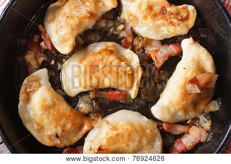 Hot Fried Dumplings In A Frying Pan Macro. Horizontal Top View